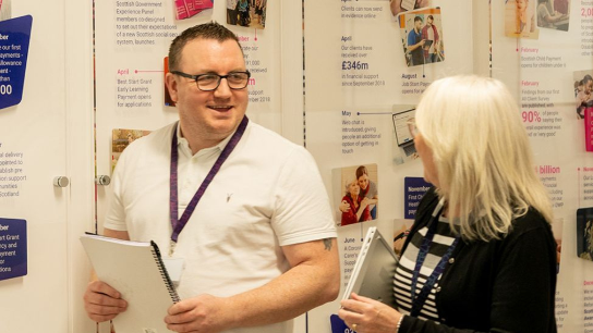 Two people walking together