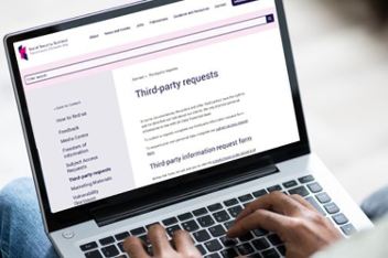 Person typing on a laptop displaying a webpage titled 'Third-party requests'.