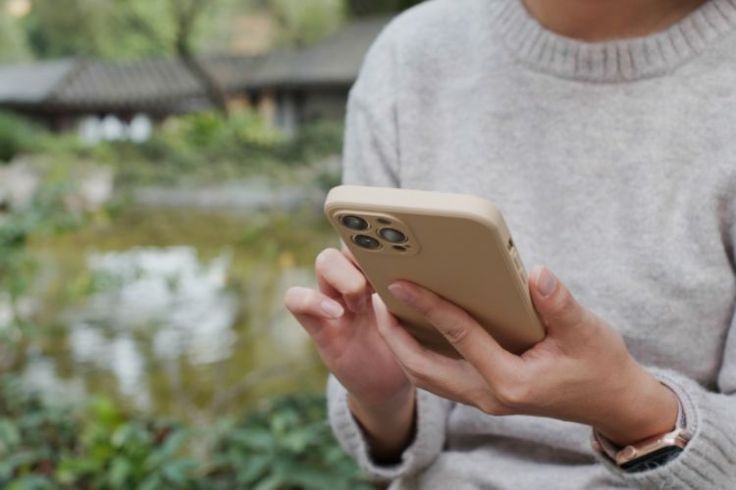 A person using a mobile phone