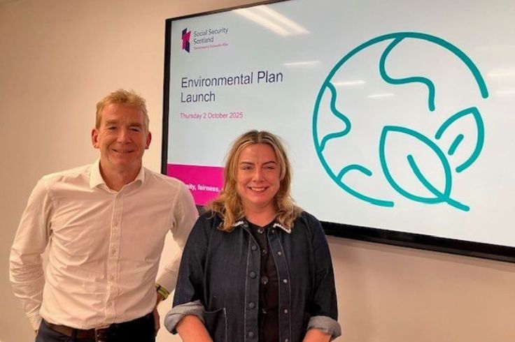 David Wallace and Cath Mackay standing in front of a TV displaying 'Environment Plan Launch'