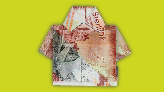 Scottish banknote folded into the shape of a shirt on a bright green background.