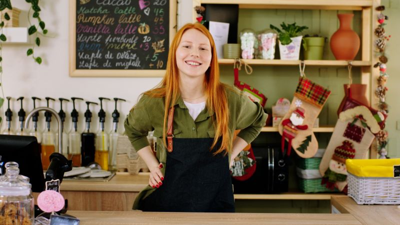 Young person at work in a cafe