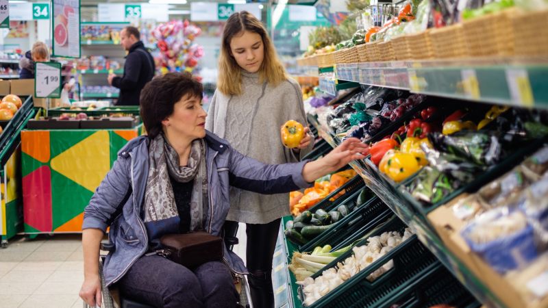 young girl caring at supermarket