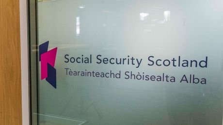 Social Security Scotland logo on window
