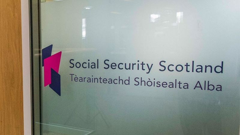 Social Security Scotland logo on window