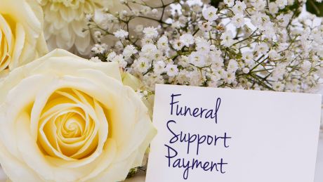 Flowers with card reading Funeral Support Payment
