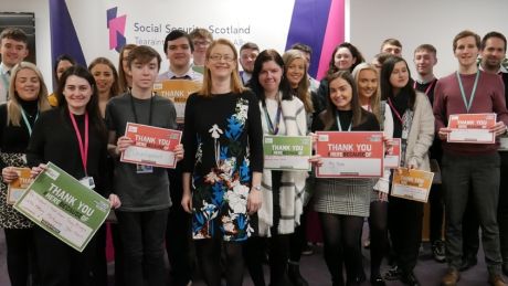 A group of Modern Apprentices standing with the Cabinet Secretary, Shirley Anne Somerville