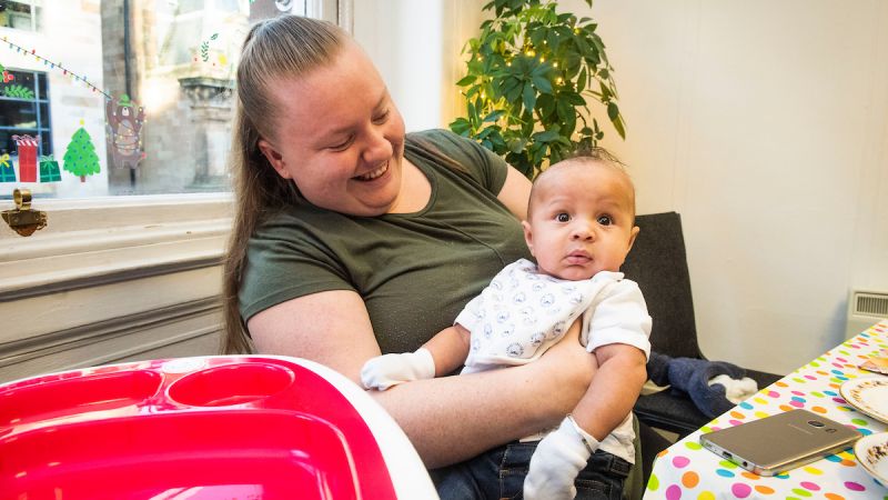 mum smiling at baby