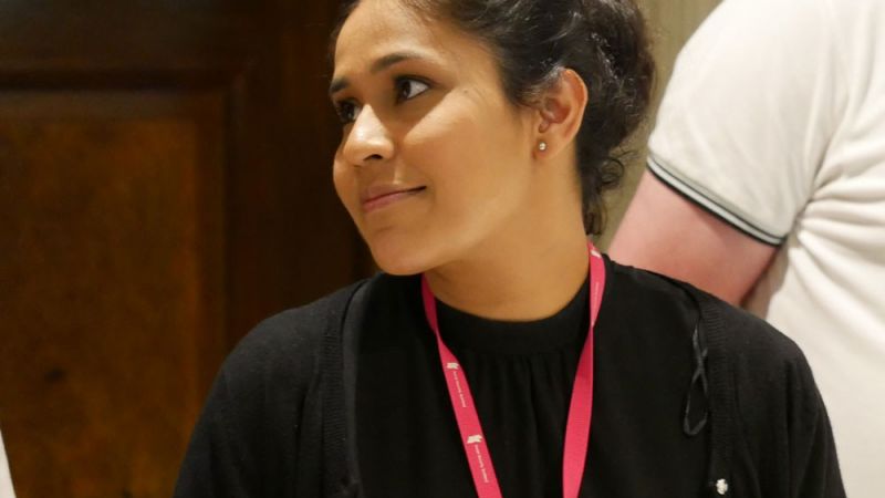 Female staff member with lanyard