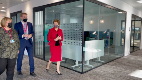 First Minister Nicola Sturgeon walks through Social Security Scotland office with Chief Executive David Wallace and Head of Client Operations Kirsty Craig.