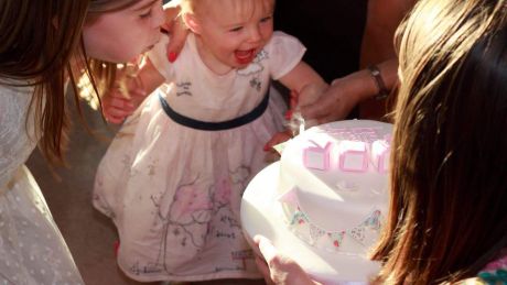 Children and a birthday cake